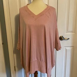 White Birch V-Neck batwing top with pockets.